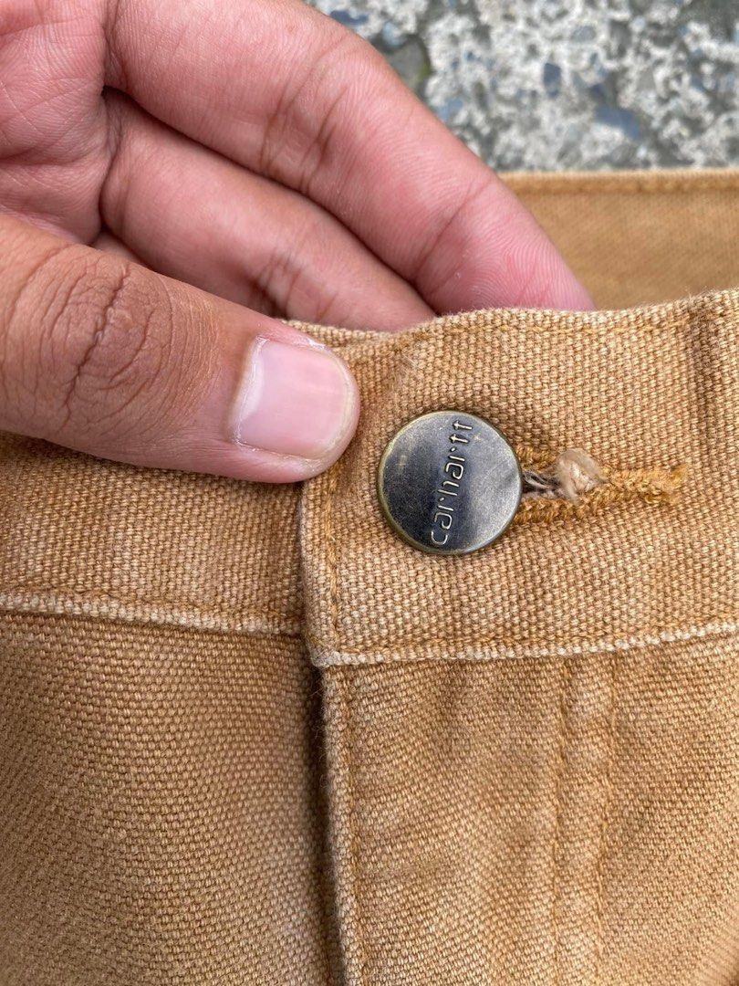 Carhartt Carpenter Pants Authentic (Category: Jeans) located in Pinamalayan. Submitted by initialthriftstore (Listing ID 1316127843, Image 2). Description: FOR SALE‼️ Carhartt Carpenter Pants Color Brown✅ Excellent condition ✅ W32x40Ldimes ✅ Issues❌ need wash and konting crack sa patch pero all goods padin Napaka crispy pa nito mga boss Pm lang po mga boss sa may gusto 🤍🙏🏻.