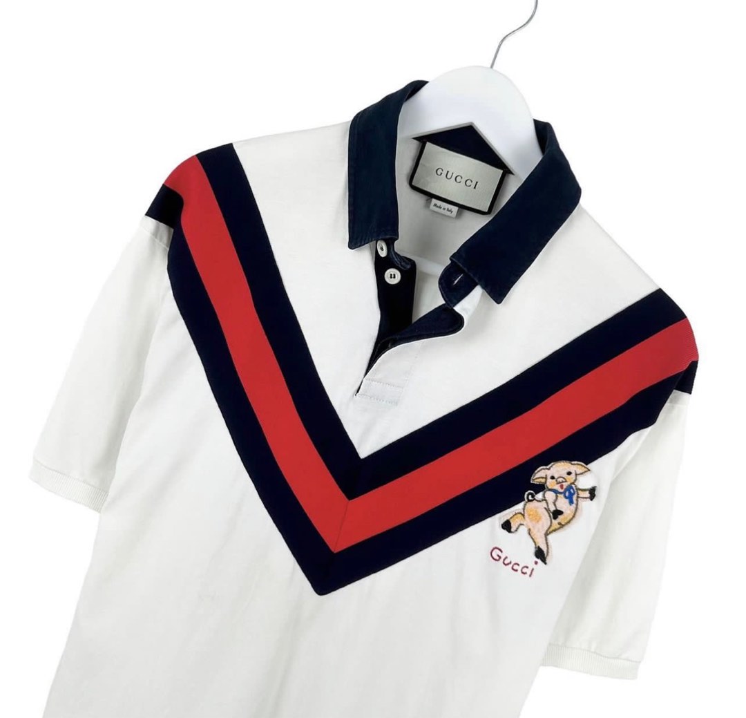 Shops chevron polo with piglet