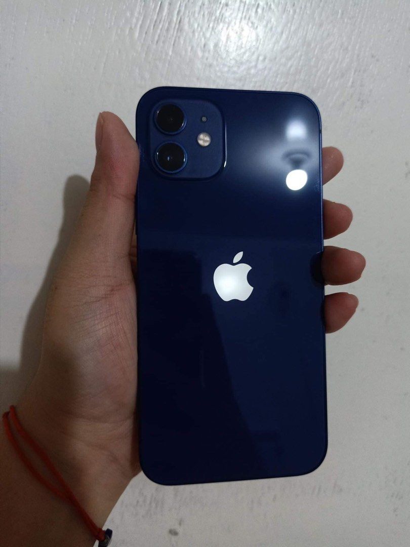 IPHONE 12 (64gb BLUE)‼️ (Category: iPhone 12 Series) located in Manila. Submitted by julsy111 (Listing ID 1316098050, Image 1). Description: FOR SALE‼️ Iphone 12 64gb Blue Inclusions - Original Box and replacement charger - Free 3 case (2 unused) - With tempered glass installed plus one free extra tempered glass No issues , smooth 82% Battery Health Face ID Working Very minimal dent on one corner (see picture attached) Unli reset RFS: will upgrad