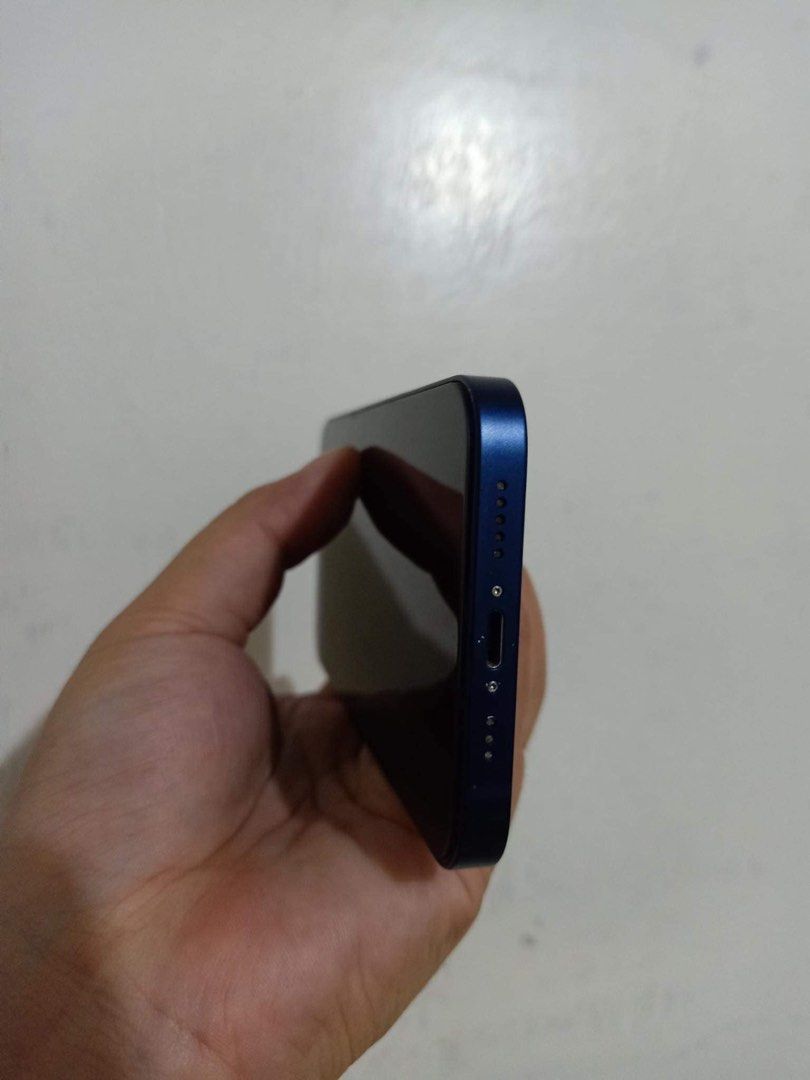 IPHONE 12 (64gb BLUE)‼️ (Category: iPhone 12 Series) located in Manila. Submitted by julsy111 (Listing ID 1316098050, Image 3). Description: FOR SALE‼️ Iphone 12 64gb Blue Inclusions - Original Box and replacement charger - Free 3 case (2 unused) - With tempered glass installed plus one free extra tempered glass No issues , smooth 82% Battery Health Face ID Working Very minimal dent on one corner (see picture attached) Unli reset RFS: will upgrad
