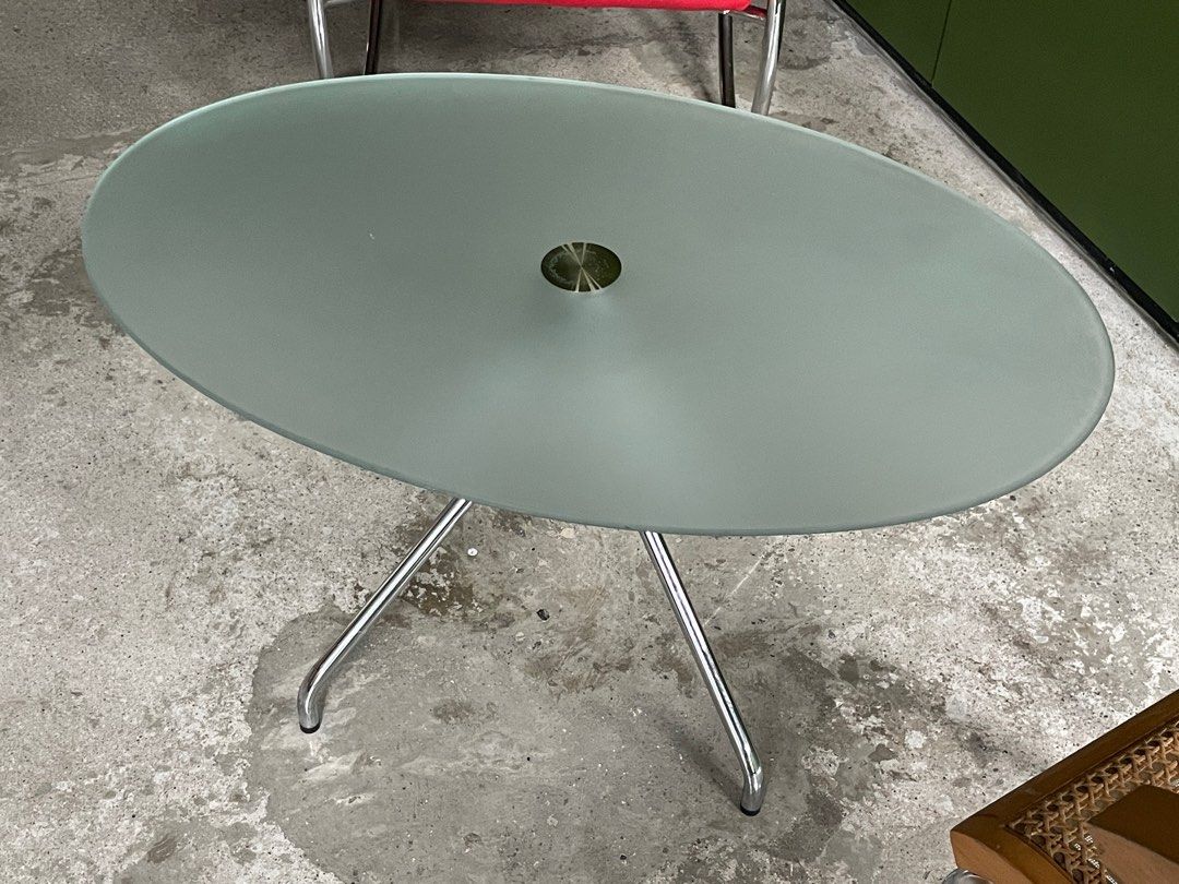 Midcentury modern glass table (Category: Tables & Sets) located in Cavite. Submitted by dosamigas (Listing ID 1316148518, Image 3). Description: Stainless steel, vintage, frosted glass table with center molded legs. Pickup lalamove at Silang Cavite.