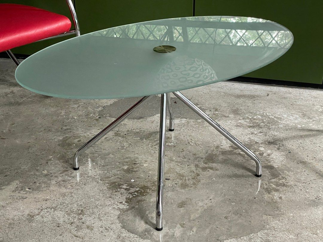 Midcentury modern glass table (Category: Tables & Sets) located in Cavite. Submitted by dosamigas (Listing ID 1316148518, Image 1). Description: Stainless steel, vintage, frosted glass table with center molded legs. Pickup lalamove at Silang Cavite.