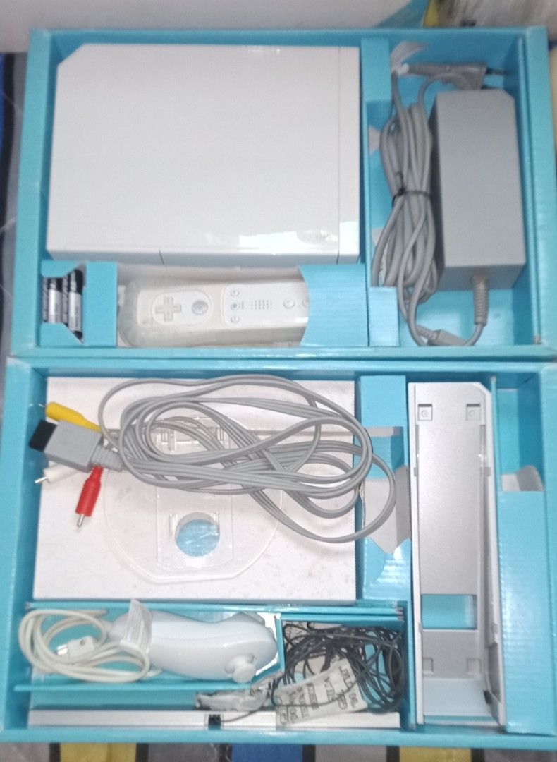 NINTENDO WII CONSOLE WITH GAMES AND ACCESSORIES. (Category: Nintendo) located in Manila. Submitted by migztoyz (Listing ID 1316107304, Image 2). Description: FOR SALE: NINTENDO WII Lot Sale All-In (Working) -Includes Games Accessories.