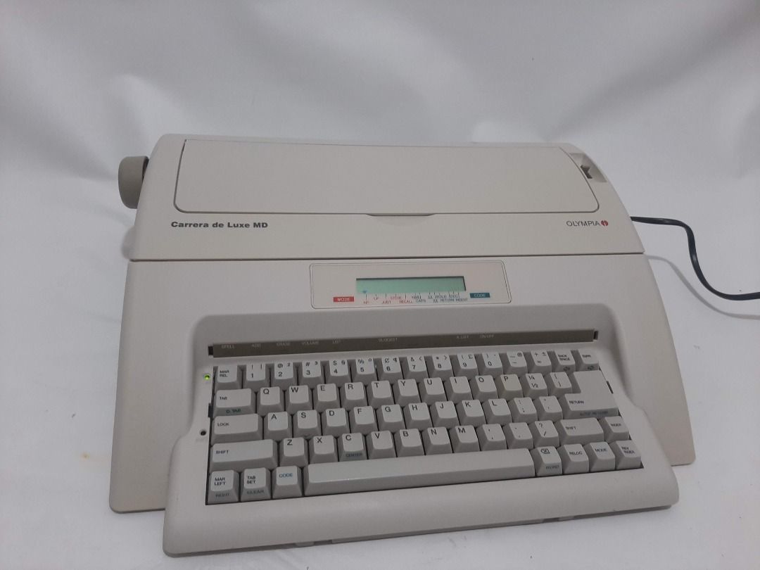 Olympia Carrera de Luxe Typewriter (Category: Office & Business Technology) located in Makati City. Submitted by glempol-1 (Listing ID 1316230240, Image 2). Description: No issue Slightly used ( days only) With personal warranty Free delivery Test before pay 220v Original Type carrier: Type wheel / 100 Write power: 11 characters / sec Scripture: 10/12/15 Line spacing: 1 / 1.5 / 2 Number of keys: 45, Max. Paper width: 330 mm Max. Writing width: 22