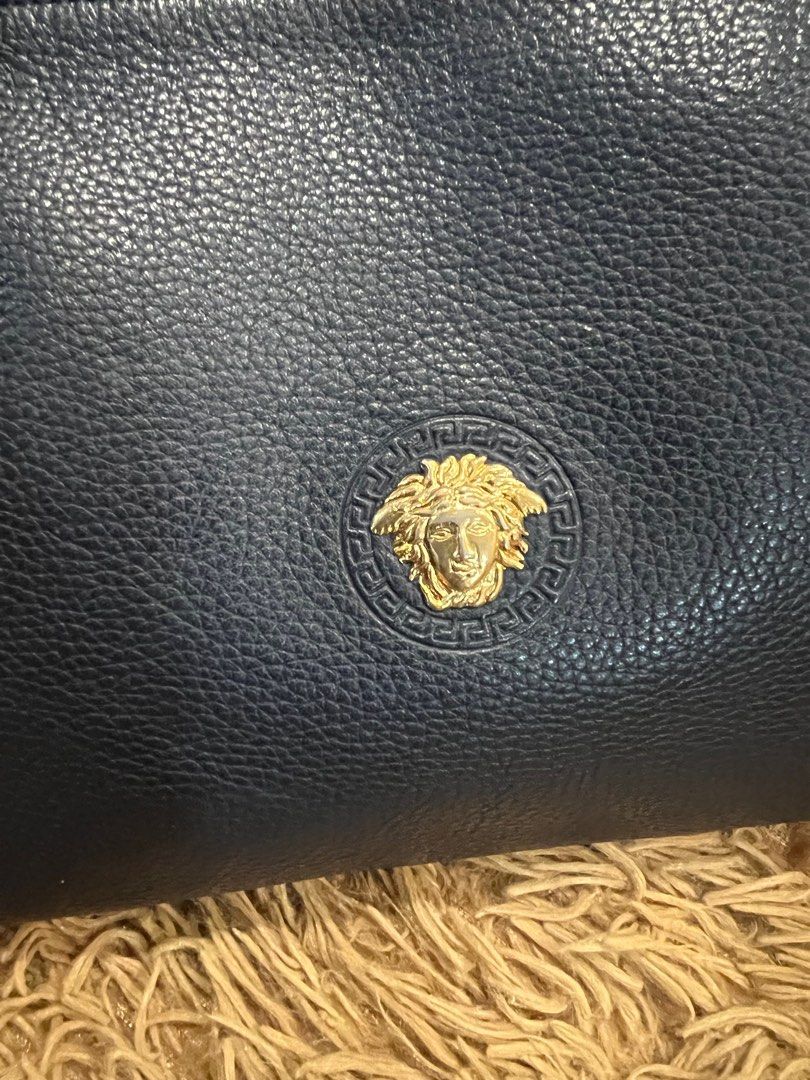 Versace (Category: Luxury Bags & Wallets) located in Lipa City. Submitted by thyra06 (Listing ID 1316100349, Image 3). Description: Versace orig good as new.