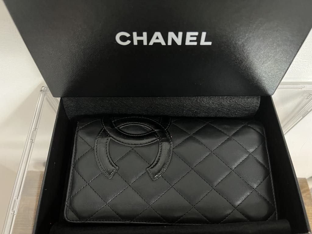 Authentic Chanel Cambon Bifold wallet (Category: Luxury Bags & Wallets) located in Las Pinas. Submitted by missyyyxx (Listing ID 1316305633, Image 1). Description: authentic 💯 vintage condition: 8.5/10 holo intact with box and authenticity card clean interior, intact exterior leather.