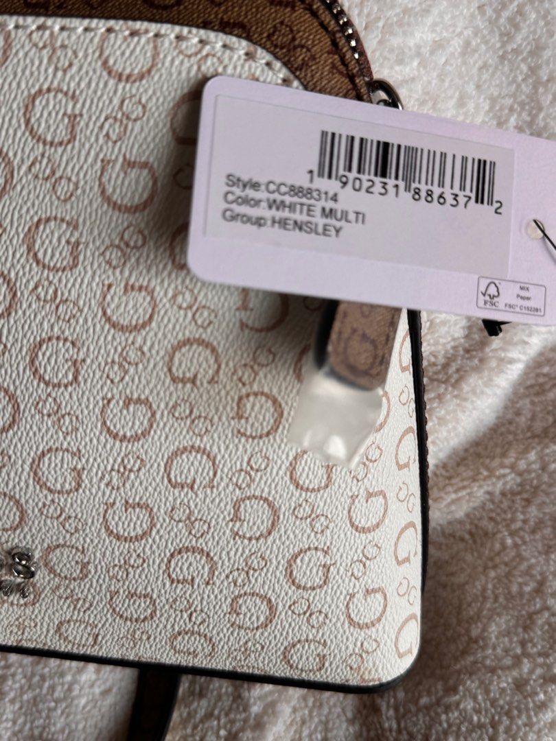 BRAND NEW AUTHENTIC GUESS SMALL SLING BAG FROM US (Category: Luxury Bags & Wallets) located in Manila. Submitted by closetdumpmnl (Listing ID 1316271272, Image 3). Description: BRAND NEW FROM US. NEVER USED. Super nice in actual. RFS: Decluttering.