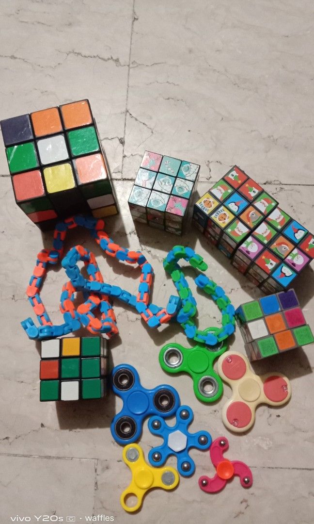 Cubes, brain teasers, fidget toys, rubiks cube (Category: Board Games & Puzzles) located in Quezon City. Submitted by threeboys09101126 (Listing ID 1316404638, Image 1). Description: preloved, 100 take all.