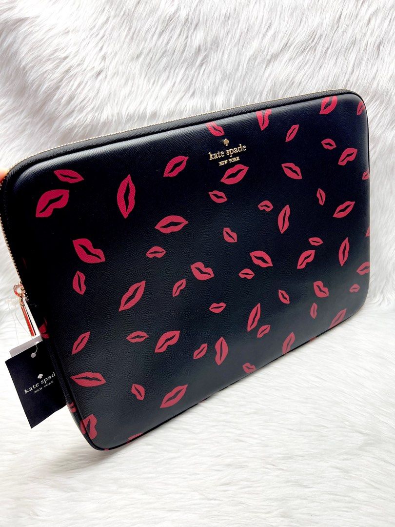 Kate Spade KS New York Laptop Case Sleeve. Fits 15 inches laptop. (Category: Purses & Pouches) located in Manila. Submitted by Authentic.Hub (Listing ID 1316400686, Image 3). Description: Kate Spade New York Laptop Case Sleeve. Fits 15 inches laptop. Measurements L:15.16” W:0.79” H:10.63” Fits Up to 15 Inch Laptop COLOUR Black Multi Silver-Toned Hardware MATERIAL Saffiano Calf Leather SIZE & FIT L:15.16” W:0.79” H:10.63” Fits Up to 15 Inch Laptop