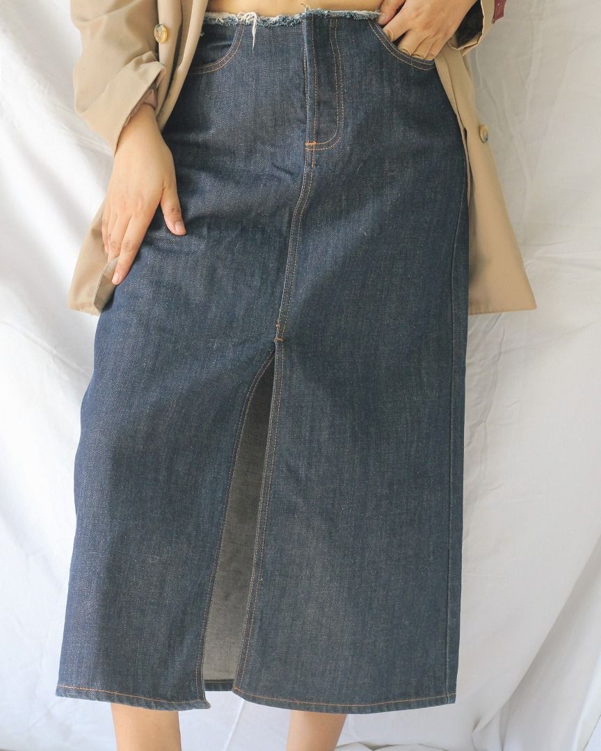 Long Denim Skirt with Front & Back Slits (Category: Skirts) located in Manila. Submitted by teeforel (Listing ID 1316417775, Image 1). Description: HQ Long Denim Skirt with Front & Back Slits. Frayed top design. Comfy A-line fit. Hidden front fastening. Still in very good condition. Size: 6 Waist = 30-32 inches Hips = 38 inches Length = 31.5 inches *Color may vary from actual item due to monitor settings or photo lighting.* Due to the nature of t