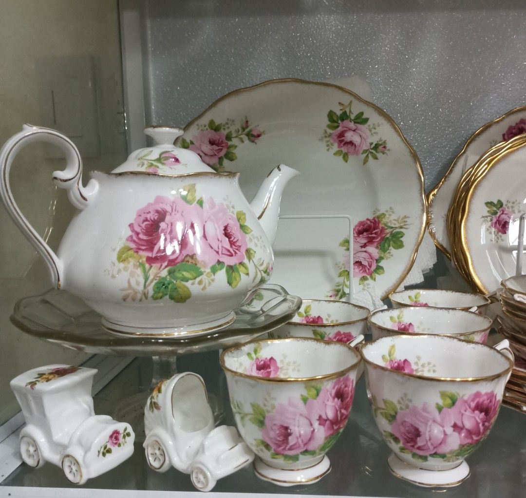 Royal Albert American Beauty (Category: Dinnerware & Cutlery) located in Pagbilao. Submitted by candicearp (Listing ID 1316279807, Image 2). Description: 6 settings Dinner Plate, Side Plate, Desert Plate, Cup and Saucer 1 Tea Pot 1 Serving Bowl 1 Creamer 1 Sugar Bowl 2 Serving Plates 1 Gravy Boat with Under Plate * NO CHIP, NO CRACKS AND IN VERY GOOD CONDITION.