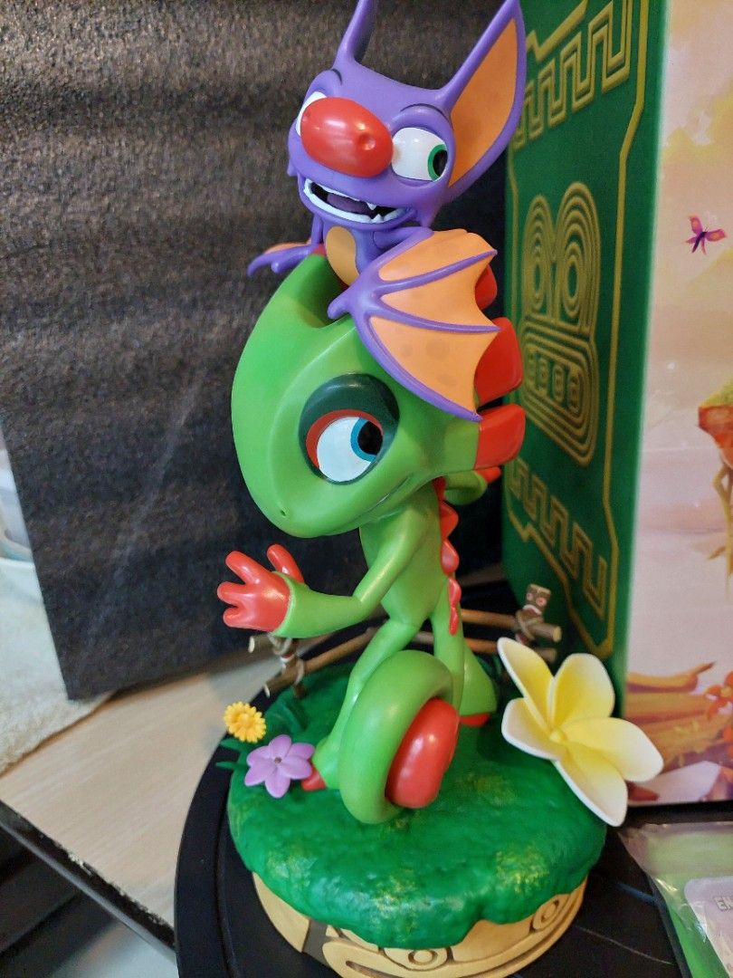Yooka Laylee PVC statue (Category: Figurines & Statues) located in Makati City. Submitted by rdee333 (Listing ID 1316368387, Image 2). Description: Displayed in glass cab. In perfect condition no issues. Complete with picture cards, pins and keychain. Payment first basis. Delivery via grab or lalamove..