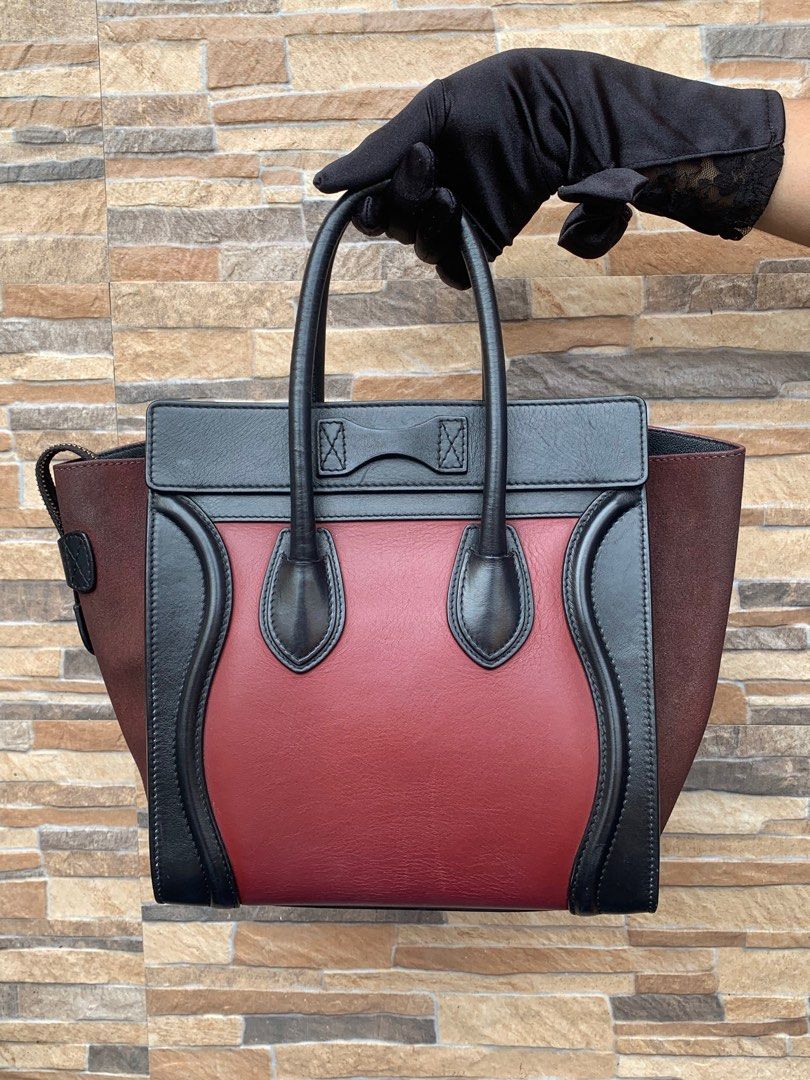 Celine Micro Luggage Handbag (Category: Luxury Bags & Wallets) located in Cavite. Submitted by justbrowsing_decluttering (Listing ID 1316555703, Image 3). Description: Handbag 2 Full Open pocket inside | 1 Zip pocket outside Color: Wine Red & Black with Gold Hardware Size: Material: Sides is Hard Suede [Colors may vary due to lighting. Bags are Preowned so it will Not be Perfect; Unless stated new.] Guaranteed Authentic💯 Condition: 7/10 Rank AB.