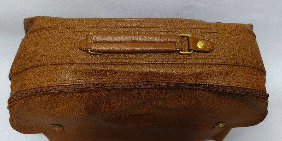 Leather Hand Carry Travel Bag (Category: Luxury Bags & Wallets) located in Baguio. Submitted by PreiLoveMaria (Listing ID 1316494434, Image 3). Description: Leather Hand Carry Travel Bag Very good used condition H: 13c L: 18" D: 7" Very Spacious Kindly check the Detailed photos Shipping via J&T only No COD and COP Item is from Japan Surplus.
