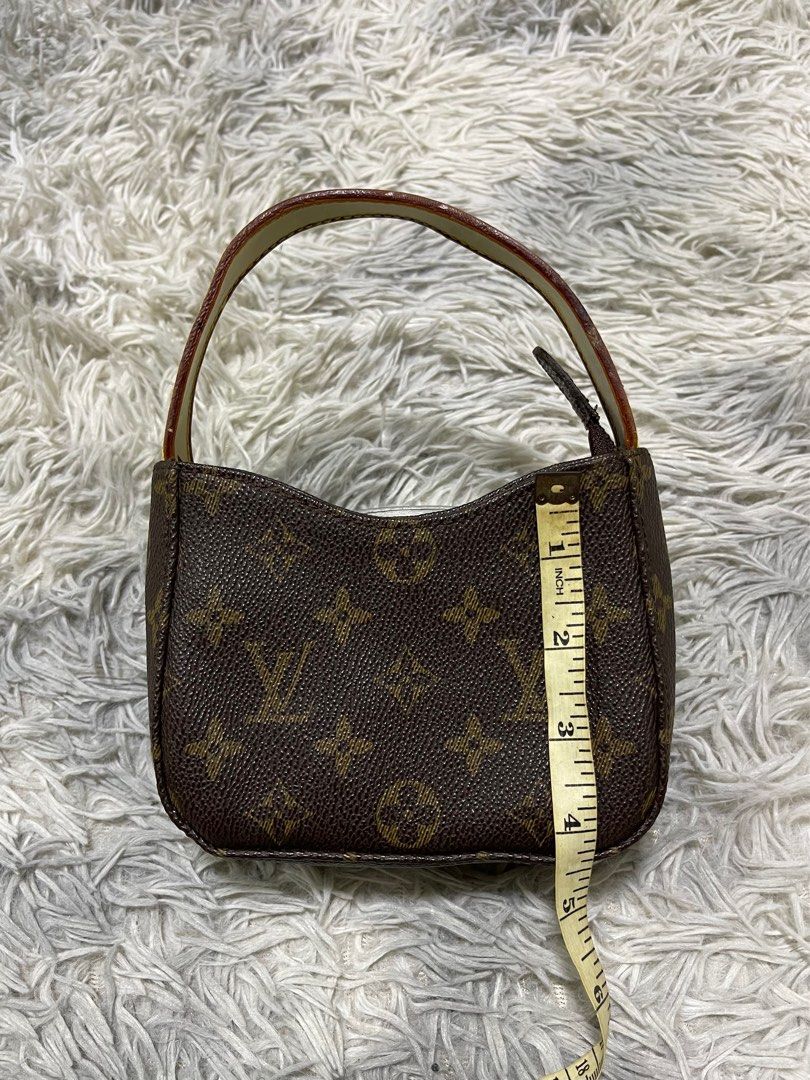 LV Monogram Mini Handbag (Category: Purses & Pouches) located in Bauang. Submitted by jasperjohn (Listing ID 1316587555, Image 3). Description: Mini Di kasya phone Pamorma ng kiddos nio👌 .