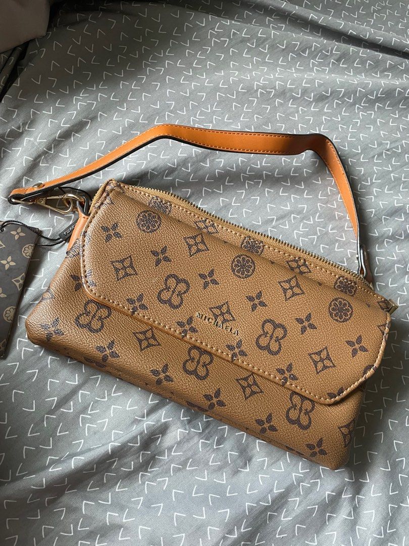 Michaela bag (Category: Cross-body Bags) located in Quezon City. Submitted by catpurrent (Listing ID 1316522170, Image 1). Description: Still with tag RFS: Impulsive buying.