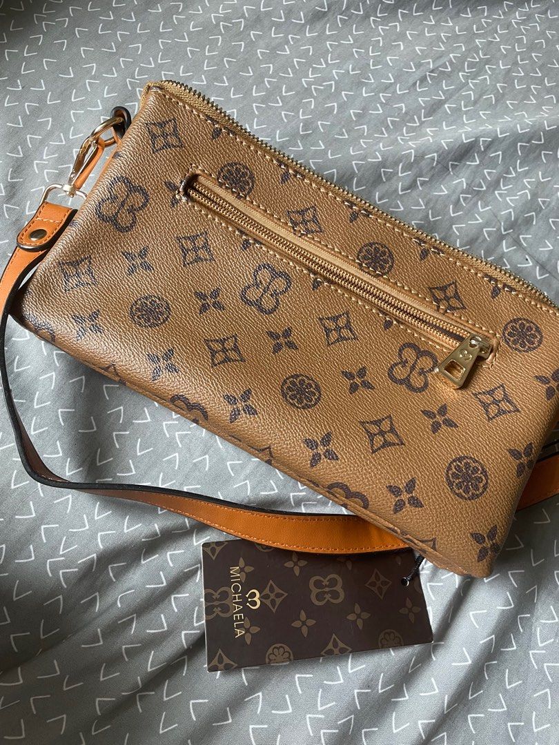Michaela bag (Category: Cross-body Bags) located in Quezon City. Submitted by catpurrent (Listing ID 1316522170, Image 2). Description: Still with tag RFS: Impulsive buying.