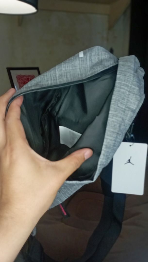Nike Jordan Belt Bag (Gray) (Category: Belt bags, Clutches and Pouches) located in San Pedro. Submitted by rodmilllopez (Listing ID 1316514571, Image 2). Description: I'm selling these items as I'm decluttering gifts and other things I no longer need. Prices are negotiable, as I've only listed their original prices and adjusted them a bit. Original price: ₱1750.95, $30.00 (Price tag) .