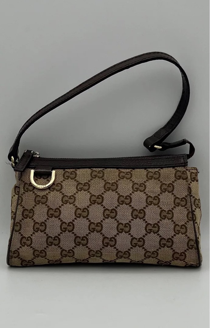 Gucci pochette monogram deals