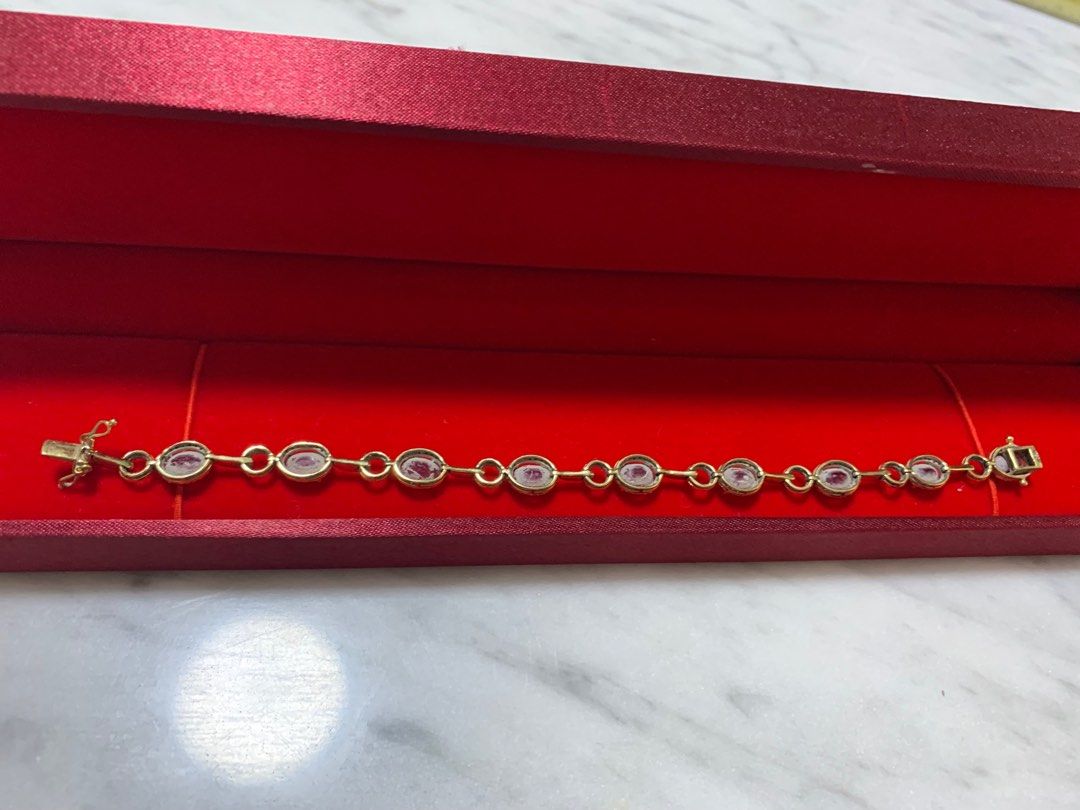 Ruby Diamond bracelet (Category: Bracelets) located in Singapore. Submitted by cgreen (Listing ID 1316499752, Image 2). Description: Glass filled rubies but natural diamonds 17 cm long GFR 9 pcs - 10.33 ct D 1.04 ct 6.96g 18k.