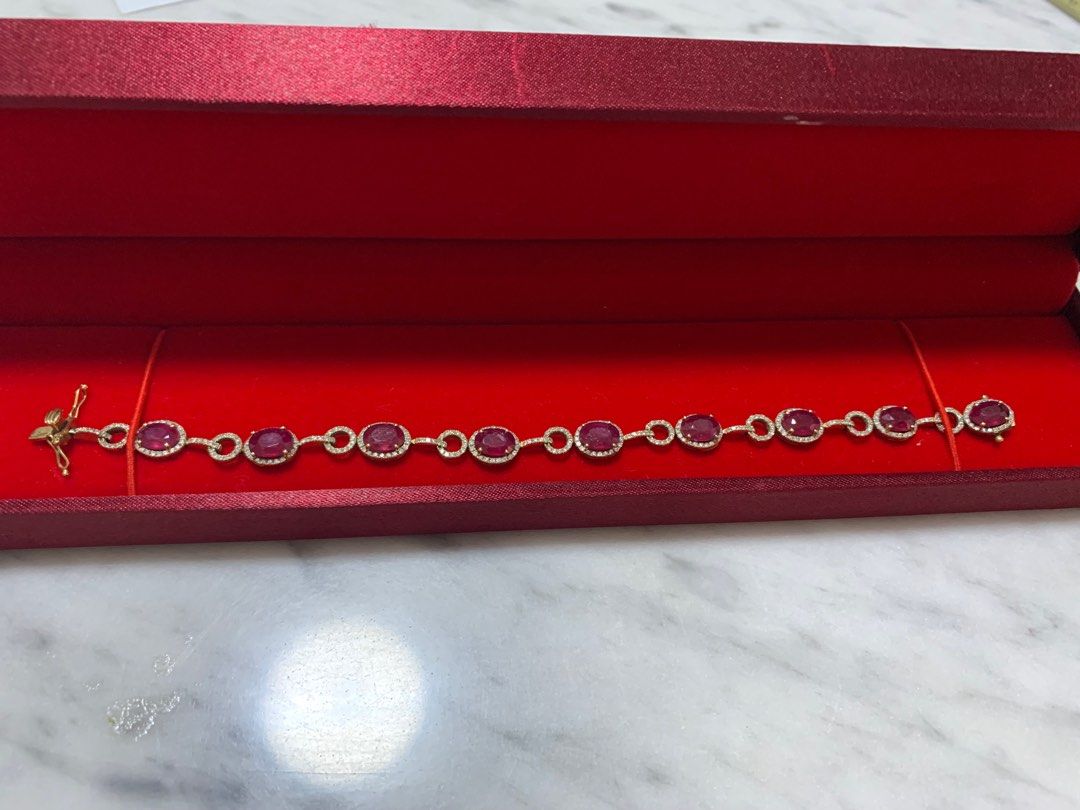 Ruby Diamond bracelet (Category: Bracelets) located in Singapore. Submitted by cgreen (Listing ID 1316499752, Image 1). Description: Glass filled rubies but natural diamonds 17 cm long GFR 9 pcs - 10.33 ct D 1.04 ct 6.96g 18k.