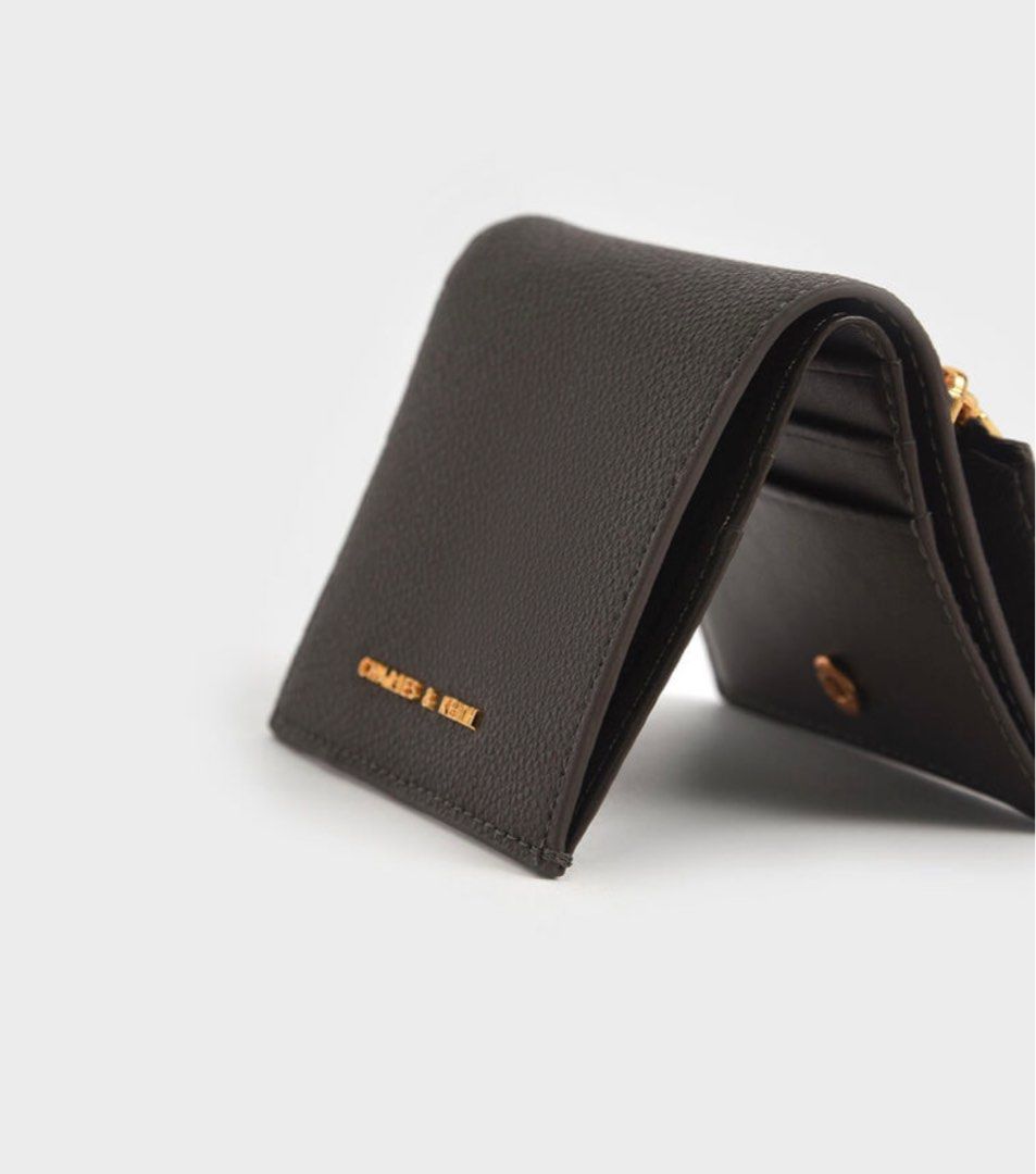 Small Wallet- Charles and Keith (Category: Bags & Wallets) located in Mississauga. Submitted by dianajyn (Listing ID 1316456563, Image 1). Description: colour- dark moss.
