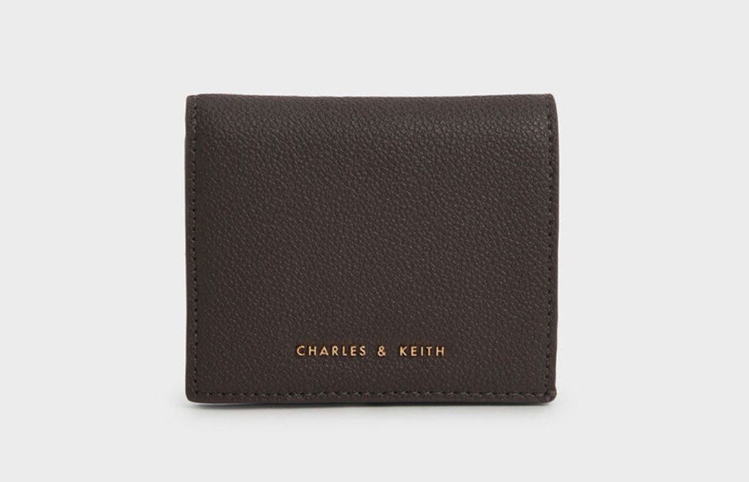 Small Wallet- Charles and Keith (Category: Bags & Wallets) located in Mississauga. Submitted by dianajyn (Listing ID 1316456563, Image 2). Description: colour- dark moss.