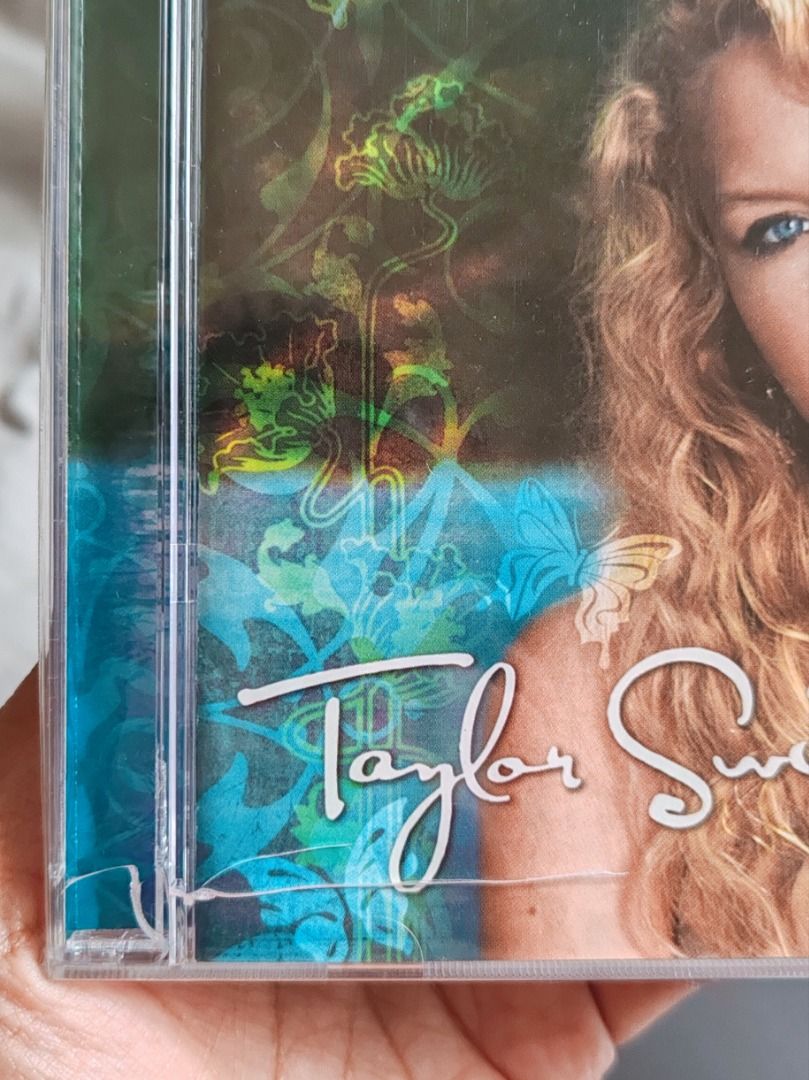 TAYLOR SWIFT DEBUT/SELF-TITLED 2006 ORIGINAL RELEASE/UNCENSORED EDITION CD (Category: CDs & DVDs) located in Paranaque City. Submitted by rouelilac (Listing ID 1310691295, Image 3). Description: TAYLOR SWIFT DEBUT/SELF-TITLED 2006 ORIGINAL RELEASE/UNCENSORED EDITION CD (BMR120702) Condition: unsealed, like new Case: comes with the original case; has a huge crack at the front (see last photo) due to mishandling in shipping CD: never used/played Re