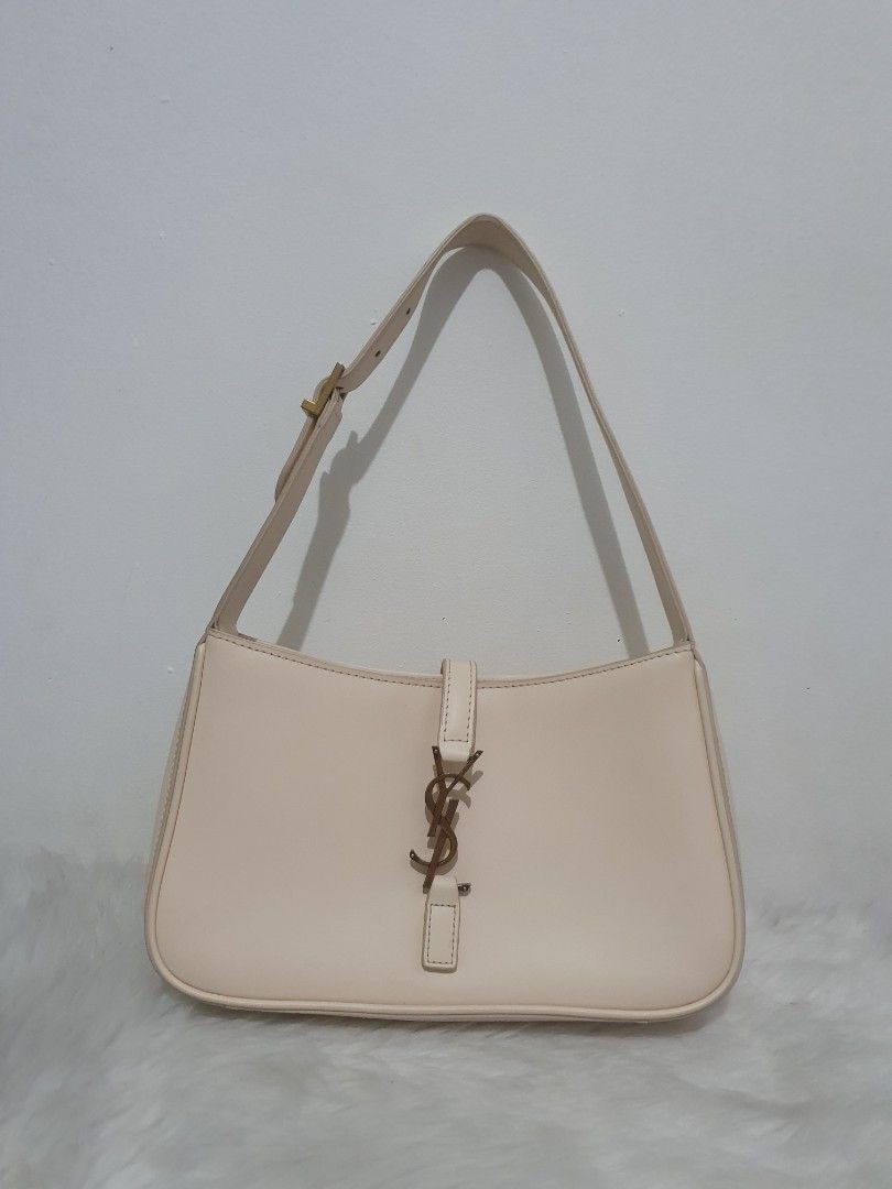 YSL HOBO SHOULDER BAG 23CM (Category: Luxury Bags & Wallets) located in San Fernando. Submitted by prelovedby.lm (Listing ID 1316546574, Image 1). Description: Korea sourced beige calfskin leather super rarefind comes with box and dustbag.