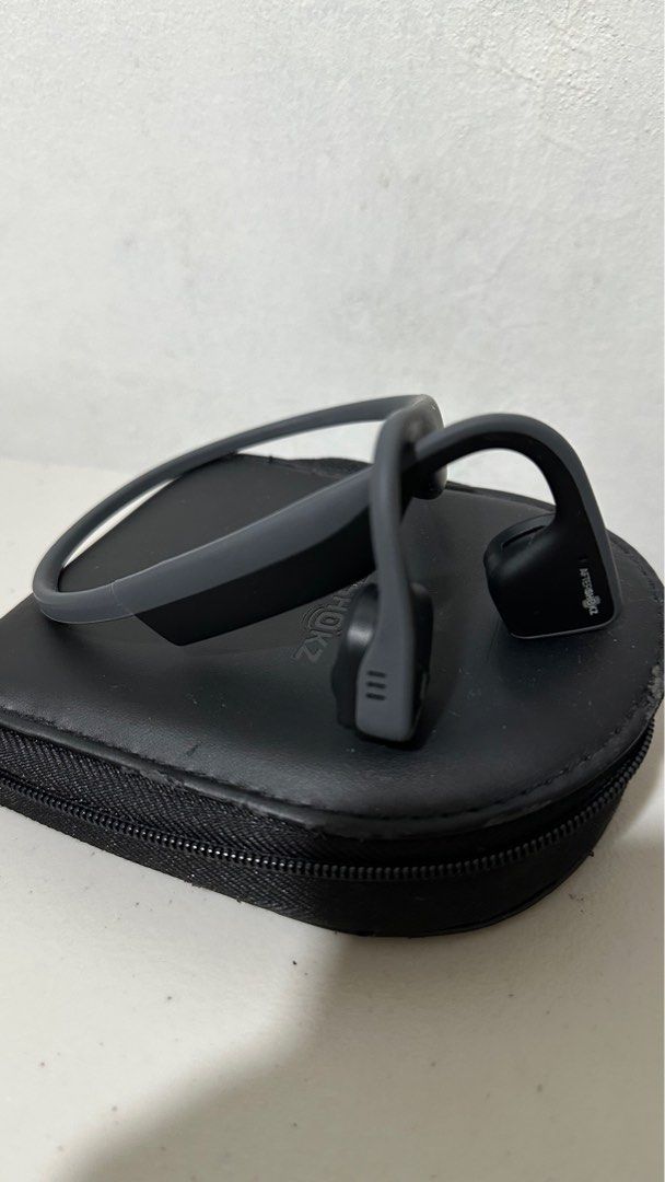 AfterShokz Titanium Bone Conduction Headset (Category: Headphones & Headsets) located in Las Pinas. Submitted by calizoosh (Listing ID 1316731127, Image 1). Description: AfterShokz Titanium Headset: - Bone Conduction - Comes with original carrying pouch - the only issue is that there is no charging port cover - Charges with micro-usb - For the pouch: the issue is that some of the leather is peeling off but its only small chunks, also comes with a
