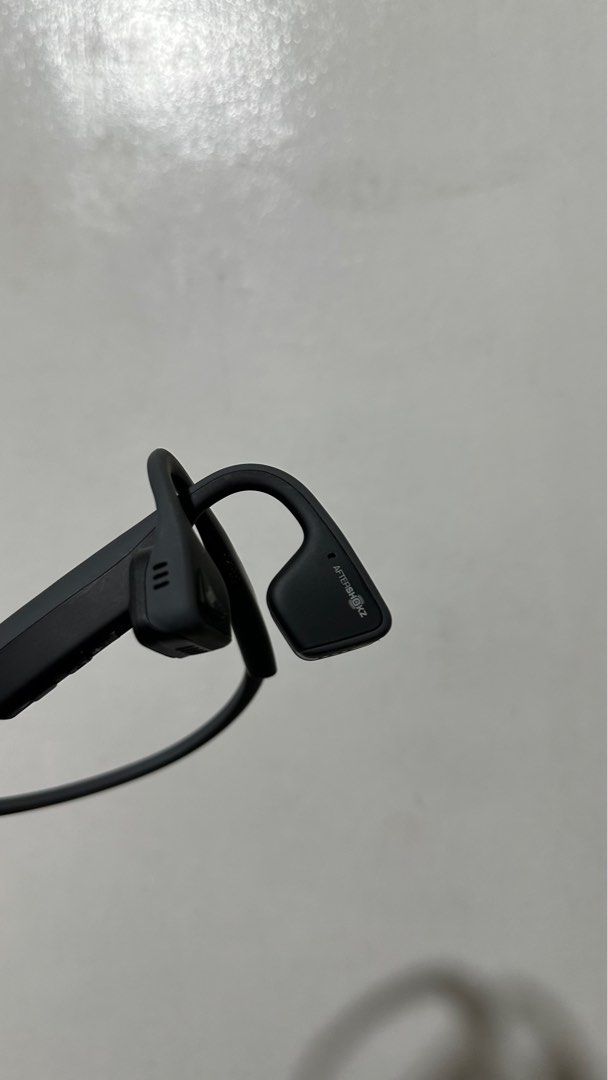 AfterShokz Titanium Bone Conduction Headset (Category: Headphones & Headsets) located in Las Pinas. Submitted by calizoosh (Listing ID 1316731127, Image 3). Description: AfterShokz Titanium Headset: - Bone Conduction - Comes with original carrying pouch - the only issue is that there is no charging port cover - Charges with micro-usb - For the pouch: the issue is that some of the leather is peeling off but its only small chunks, also comes with a
