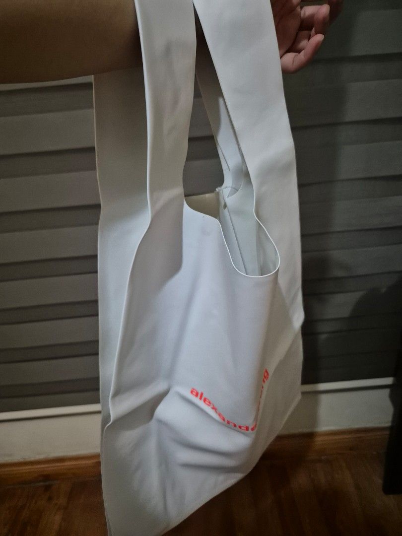 Alexander Wang PVC tote (white) (Category: Tote Bags) located in Pasig City. Submitted by 53888 (Listing ID 1316782264, Image 3). Description: authentic Alexander Wang PVC tote almost new.