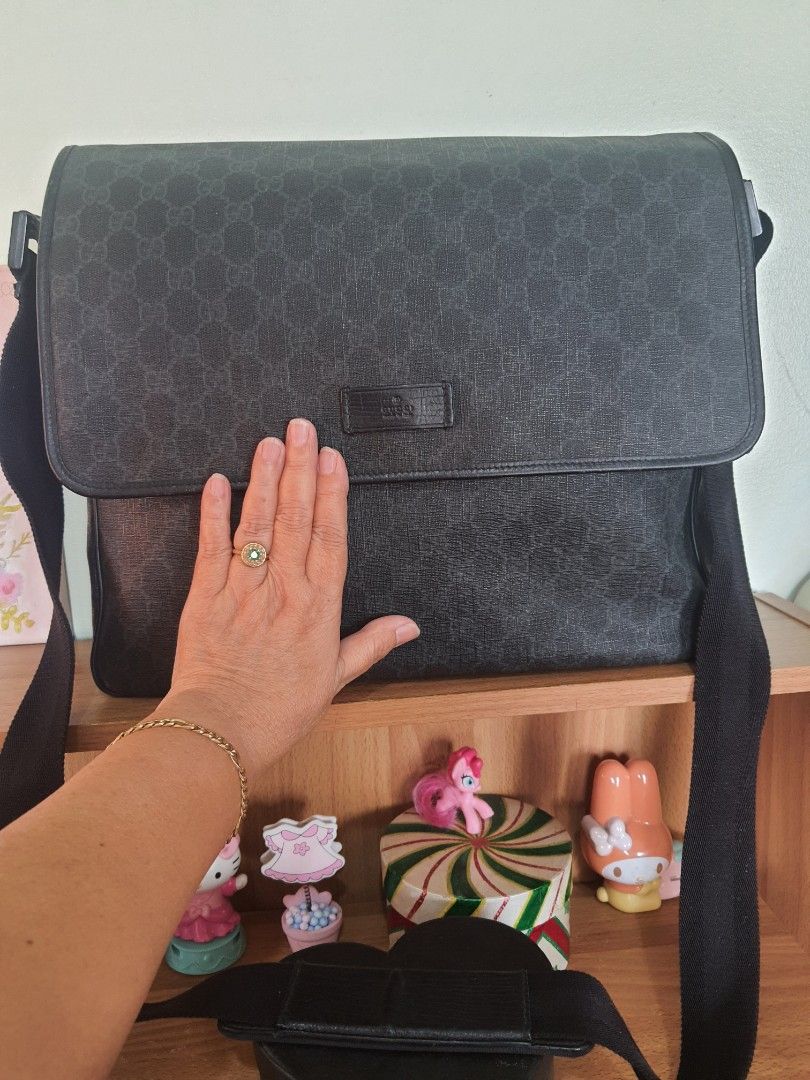 Authentic GG Monogram Gucci Bag (Category: Luxury Bags & Wallets) located in Quezon City. Submitted by pinksgate31 (Listing ID 1316628132, Image 3). Description: Authentic Coated Canvas Monogram Gucci. 100% Legit, money back guarantee. Ready to deliver, free shipping within Metro Manila..