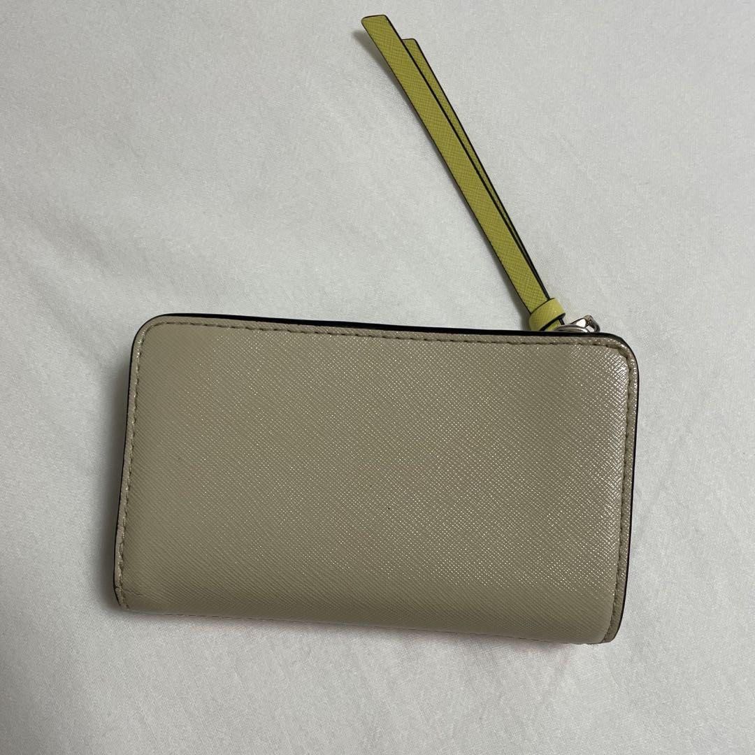 Authentic Marc Jacobs snapshot compact wallet (Category: Luxury Bags & Wallets) located in Bacolod City. Submitted by judith1030 (Listing ID 1316700549, Image 3). Description: heavily used authentic not so good condition (rust, peeling, etc).