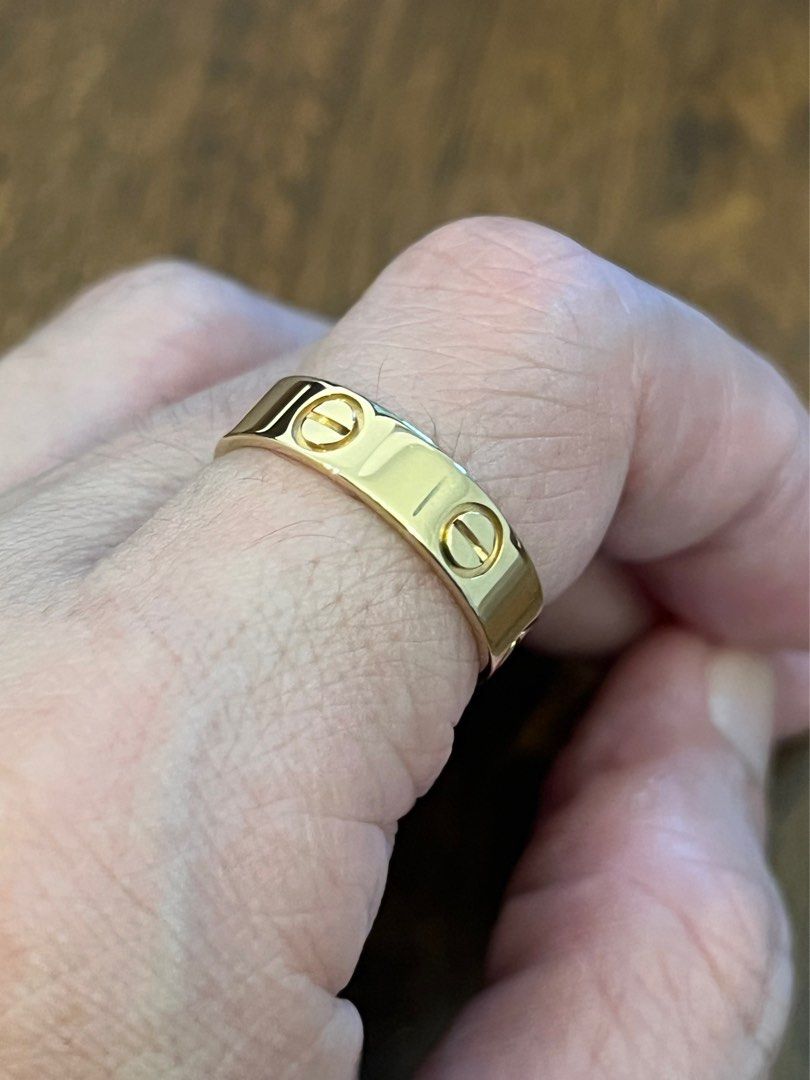 CARTIER LOVE RING 750 YELLOW GOLD SIZE 56 PAWNABLE PLS SEE ALL PHOTOS FOR DETAILS SHOT IN DIFFERENT LIGHTING RING ONLY WITH PROVIDED BOX Women s Fashion Jewelry Organizers Rings on Carousell
