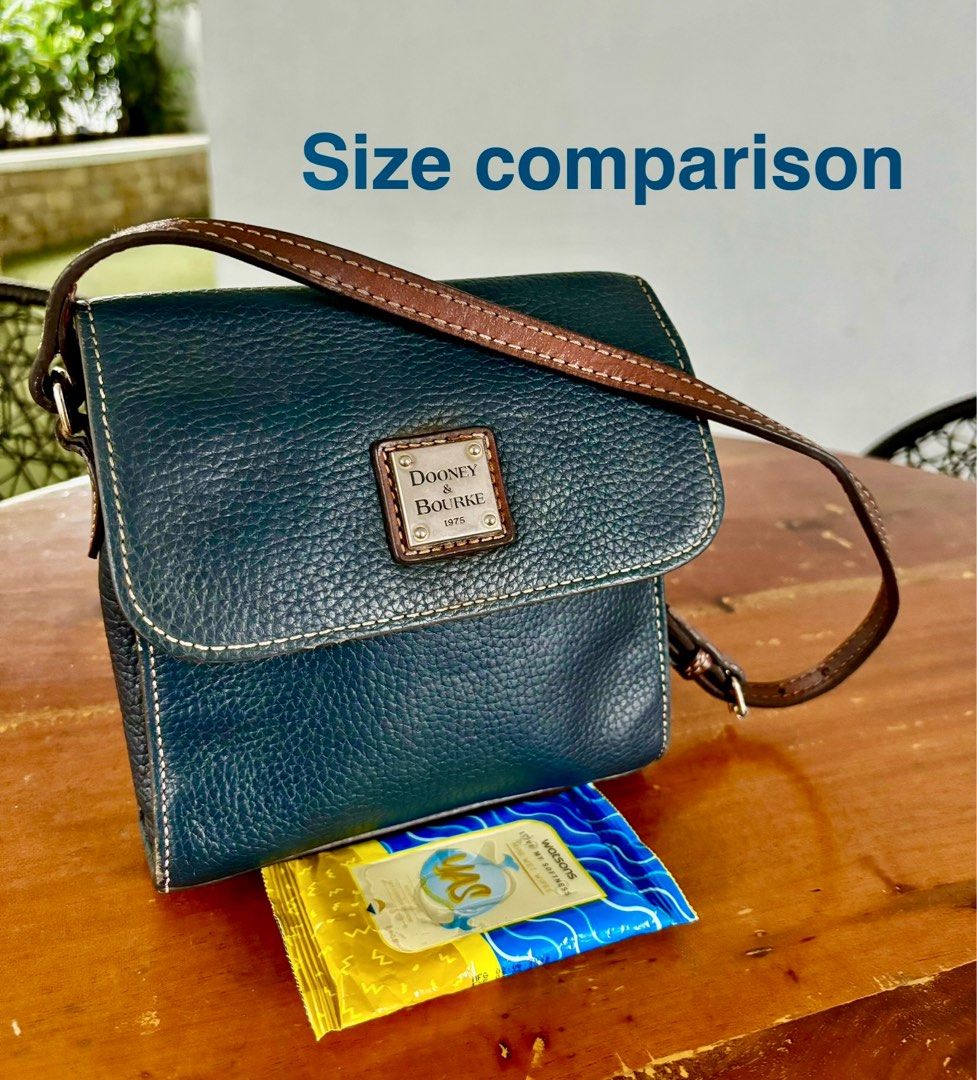 Dooney & Bourke Saffiano Letter Carrier (Category: Cross-body Bags) located in Pasig City. Submitted by lexans_bentables (Listing ID 1316681142, Image 1). Description: Authentic Dooney & Bourke Saffiano Letter Carrier bag ❣️ CLEARANCE SALE ❣️ - saffiano leather - magnetic snap enclosure - one outside pocket, one inside zip pocket - 7.25 in x 2.75 in x 7.25 in - normal signs of use (e.g., scratches) - no peeling or cracking parts NOTE❗️❗️❗️ - inte