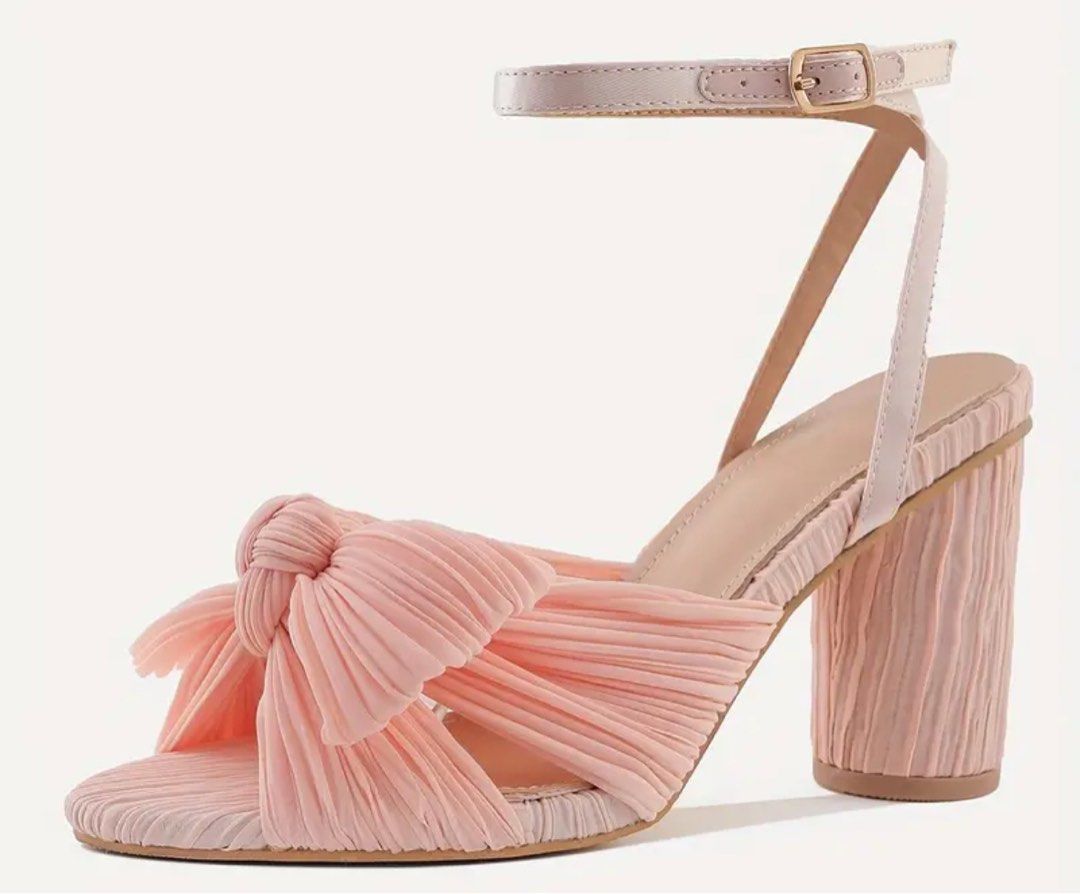Elegant Bowknot block high heels pink size 8 (Category: Heels) located in Quezon City. Submitted by nixieeee (Listing ID 1316670882, Image 1). Description: Used for reception Bought online for almost 2 k Very comfortable, lace ribbon Around 1.5 heels Location: near San Mateo Rizal.