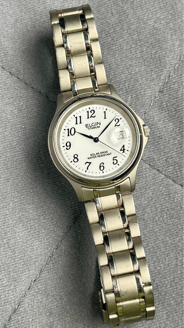 Elgin Solar Titanium watch (Category: Men's Watches) located in Manila. Submitted by olxph_400275733 (Listing ID 1316683809, Image 1). Description: Nice arabic numbers dial, long bracelet..