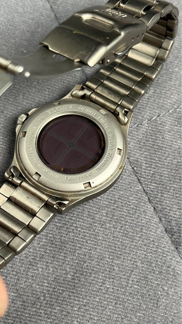 Elgin Solar Titanium watch (Category: Men's Watches) located in Manila. Submitted by olxph_400275733 (Listing ID 1316683809, Image 3). Description: Nice arabic numbers dial, long bracelet..