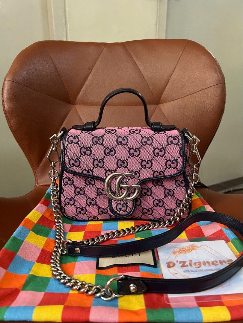 Gucci GG Marmont Multicolor Top handle (Category: Luxury Bags & Wallets) located in Quezon City. Submitted by DZignersbyZsa (Listing ID 1316625921, Image 1). Description: Authenic Gucci GG Marmont Multicolor top handle (2 way bag) Comes with dustbag With very minimal signs of use (not noticeable) Otherwise excellent. Can fit promax and compact wallet More detailed photos available upon request. What you see is what you will get..