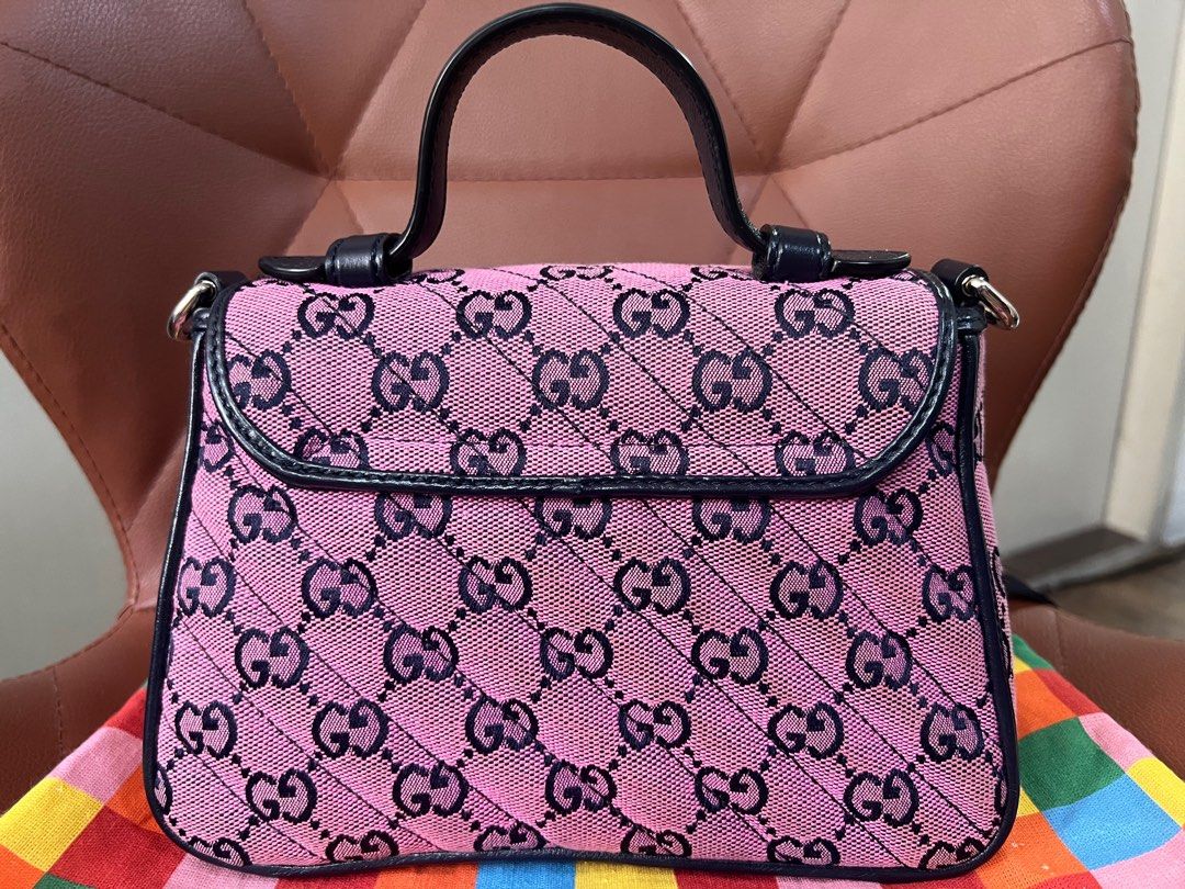 Gucci GG Marmont Multicolor Top handle (Category: Luxury Bags & Wallets) located in Quezon City. Submitted by DZignersbyZsa (Listing ID 1316625921, Image 3). Description: Authenic Gucci GG Marmont Multicolor top handle (2 way bag) Comes with dustbag With very minimal signs of use (not noticeable) Otherwise excellent. Can fit promax and compact wallet More detailed photos available upon request. What you see is what you will get..