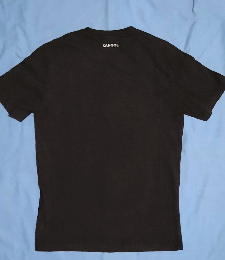 Kangol (British brand) - men's black logo t-shirt (Category: Tshirts & Polo Shirts ) located in Lapu Lapu. Submitted by ralphralf (Listing ID 1316644993, Image 3). Description: Brand : Kangol (British brand) men's tee S/S - short sleeves Color: black with Kangol's logo ( kangaroo) Size: Small as on tag Dimes: 18.5 x 26 (see photos) Fabric: 100% cotton Soft/high quality thick fabric Ready to wear, washed and ironed already NO ISSUES, please manage