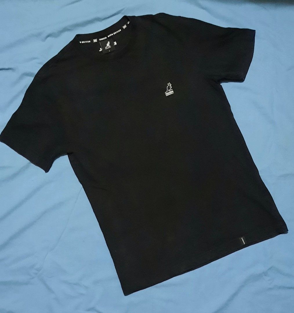 Kangol (British brand) - men's black logo t-shirt (Category: Tshirts & Polo Shirts ) located in Lapu Lapu. Submitted by ralphralf (Listing ID 1316644993, Image 1). Description: Brand : Kangol (British brand) men's tee S/S - short sleeves Color: black with Kangol's logo ( kangaroo) Size: Small as on tag Dimes: 18.5 x 26 (see photos) Fabric: 100% cotton Soft/high quality thick fabric Ready to wear, washed and ironed already NO ISSUES, please manage