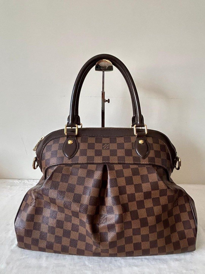 LV Trevi GM Bag (Category: Luxury Bags & Wallets) located in Manila. Submitted by bagislifeshop (Listing ID 1316786891, Image 2). Description: ☑️Available in Pampanga ✅Datecode: AR0160 ✅Condition: 8.5/10 ✅Material: Damier ebene coated canvas leather ✅Inclusions: Dustbag and long strap .