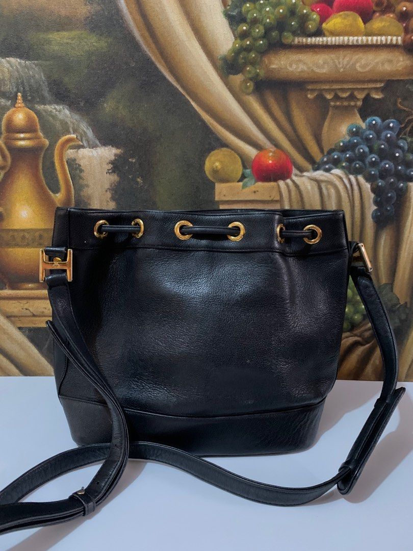 MCM bucket bag (Category: Luxury Bags & Wallets) located in Muntinlupa City. Submitted by phbudgetluxuryfinds (Listing ID 1316668084, Image 3). Description: Authentic 💯 Genuine Leather 💯 Clean interior Turnable screw on emblem plate Adjustable strap Black color .