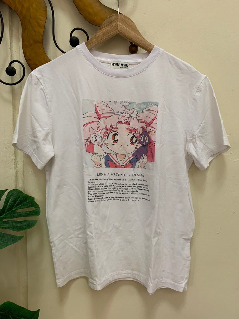 Miu Miu x Sailor Moon shirt (Category: Luxury Apparel) located in Calamba. Submitted by mineyourscollection (Listing ID 1316808574, Image 1). Description: Preloved In good condition Issue: minimal stains, barely noticeable Size: width: 20 inches; length: 23.5 inches Best fit medium for women .