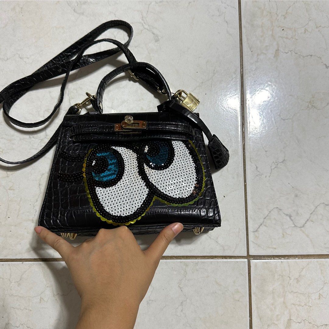 Play No More Black Sling Bag (Category: Luxury Bags & Wallets) located in Pasig City. Submitted by decluttertrends (Listing ID 1316643275, Image 2). Description: -good as new -flaws/ signs of usage on pic #5-8 -inside of bag very clean -hardware under is clean -korean bag brand -condition 8/10.