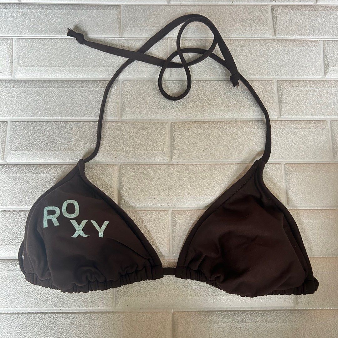 Roxy String Bikini Top (Category: Bikinis & Swimsuits) located in Manila. Submitted by sheelavie (Listing ID 1316720414, Image 2). Description: Price when bought: Size: Fits Small (32-34) Brand: Roxy Color: Brown Condition: 8/10 Detail/s: Preloved - String style Bikini - No pads included but it has a pad slot to put the pads .