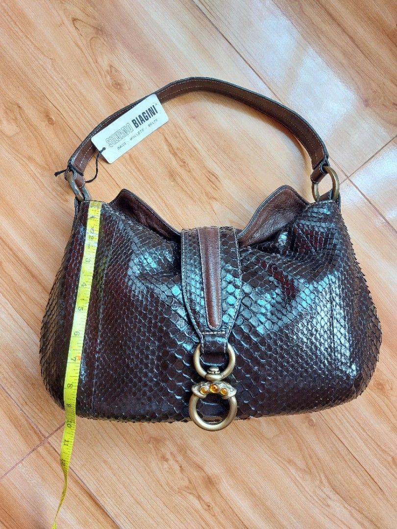 Silvano Biagini bag (Authentic Luxury) (Category: Luxury Bags & Wallets) located in Davao. Submitted by wengbagstuff (Listing ID 1316706627, Image 3). Description: 🍀 python material & genuine leather 🍀 Italian designer bag (pricey on market) 🍀 flawless body but w/ tarnish on hardwares 🍀 w/ 3 stones (i think it's citrine).
