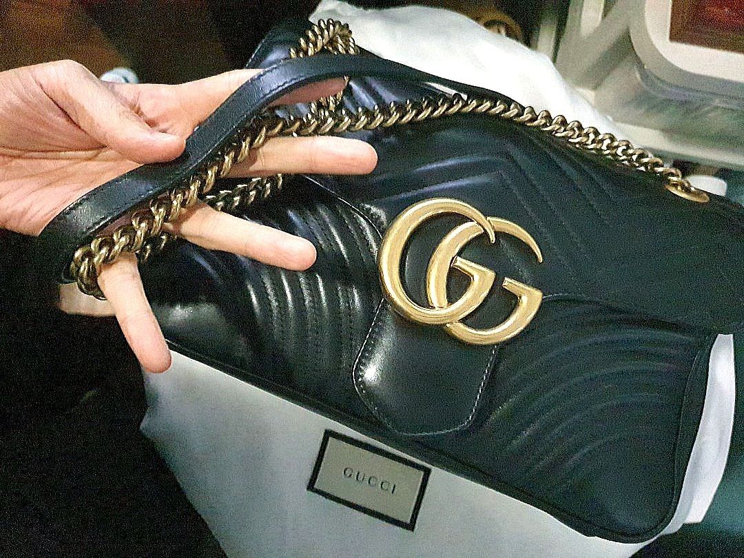 AUTHENTIC GUCCI Marmont Medium (Category: Luxury Bags & Wallets) located in Pasig City. Submitted by preloved_ramen21 (Listing ID 1316140316, Image 1). Description: BRAND: GUCCI SIZE: Medium CONDITION: Well used Inclusions: dustbag brand cards receipt.